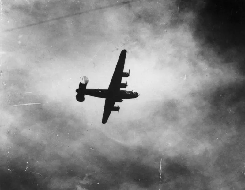 An airborne B-24 Liberator of the 34th Bomb Group.