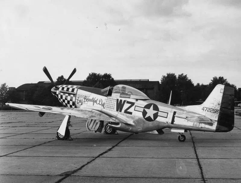A P-51 Mustang (WZ-I, serial number 44-72258) nicknamed "Big Beautiful Doll" of the 84th Fighter Squadron, 78th Fighter Group, flown by Colonel J.D. Lander.