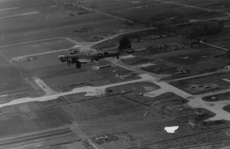 A B-17 Flying Fortress of the 385th Bomb Group prepares to land at Great Ashfield. Handwritten on reverse: 'T.G. Ivie' [Address].